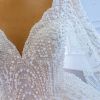 Picture of White luxury long sleeve wedding dress For Women 2022 V-neck Robe De Mariee beading pearls lace up bridal dress, 67228